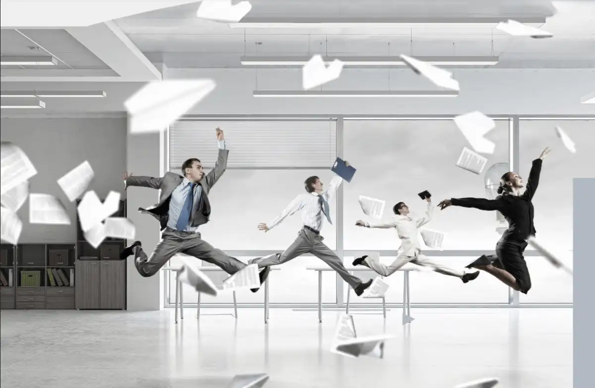 people throwing papers